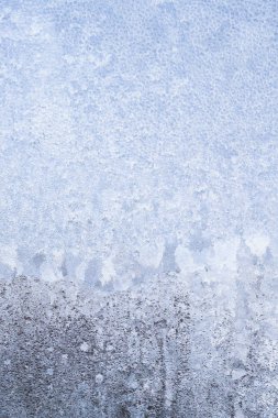 Kış soğuk desenleri donmuş buz penceresinde