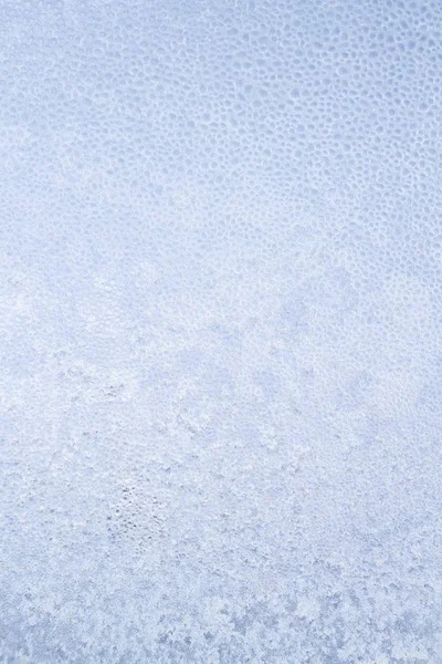 Vinter frostiga mönster på fönstret fryst is — Stockfoto