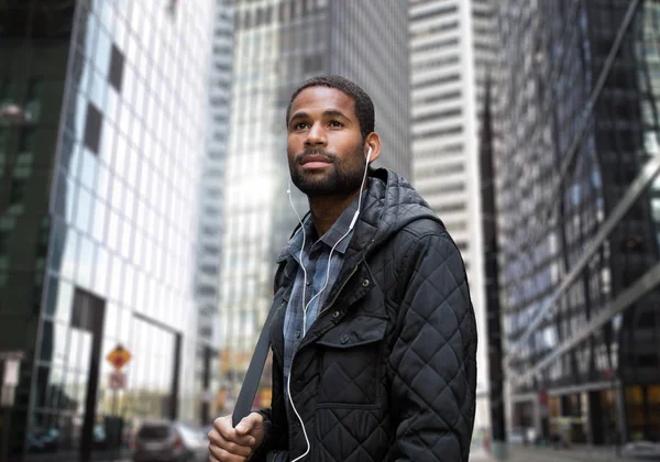 Young African American man in business district — Stock Photo, Image