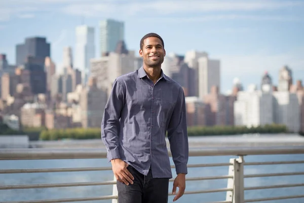 Young handsome African American man smiling and looking optimist — Stock Photo, Image