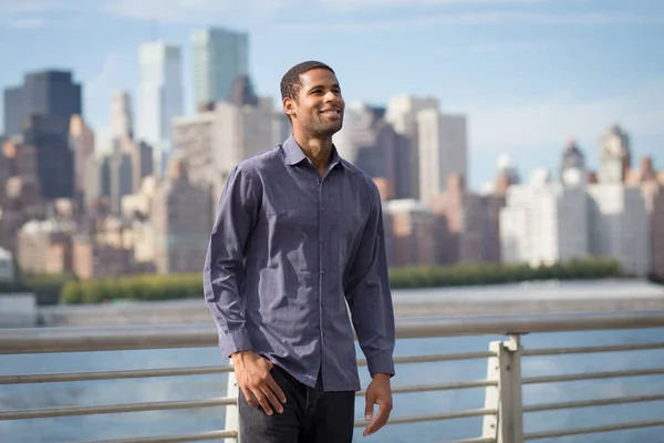 Young handsome African American man smiling and looking optimist — Stock Photo, Image