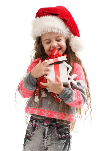 Criança pequena feliz no traje segurando uma caixa com um presente . — Fotografia de Stock