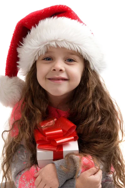 Happy small child in costume holding a box with a gift. Royalty Free Stock Images