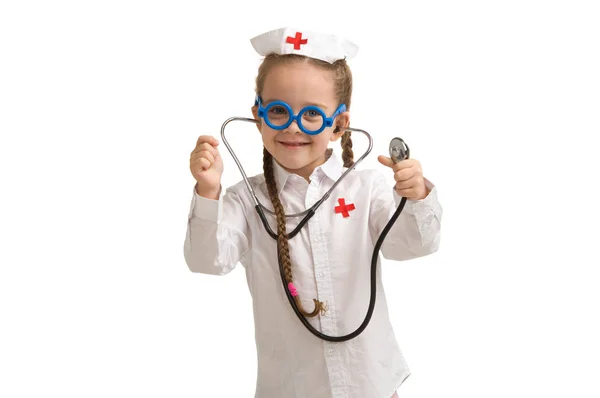 Little girl in nurse costume. Royalty Free Stock Images