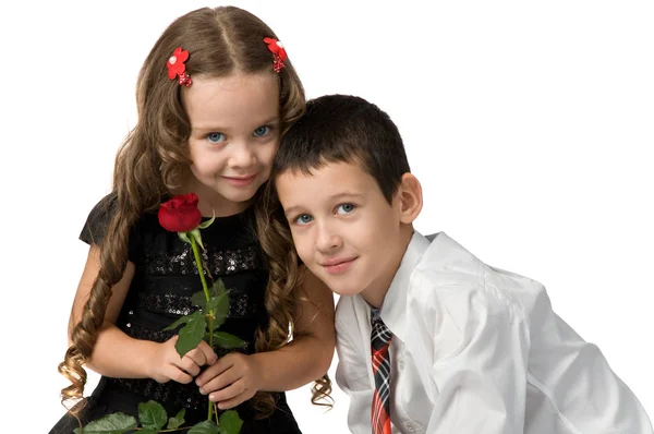 Small children with flowers. — Stock Photo, Image