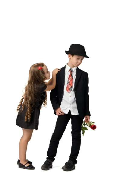 Small children with flowers. a boy and a girl. — Stock Photo, Image