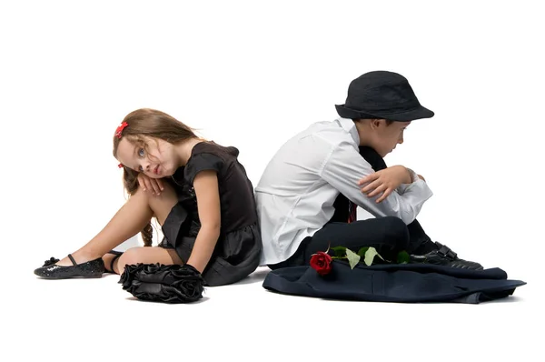 Boy and girl turned away to each other — Stock Photo, Image