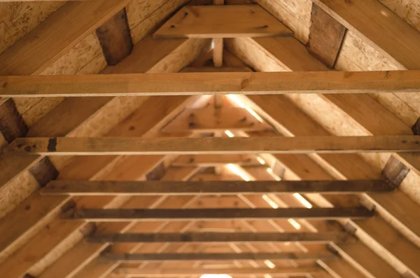 Interior view of a wooden roof structure. Stock Photo