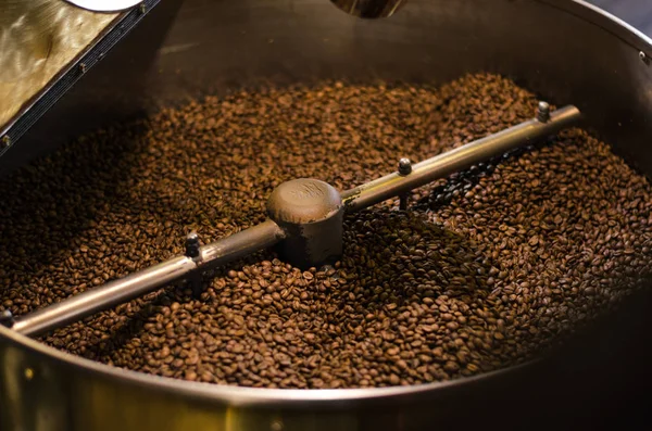Industrial roasting coffee beans. Equipment demonstration. Lviv coffee shop.