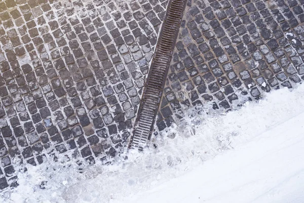 Invierno vintage pavimentación piedras superficie fondo. vista superior Imagen De Stock