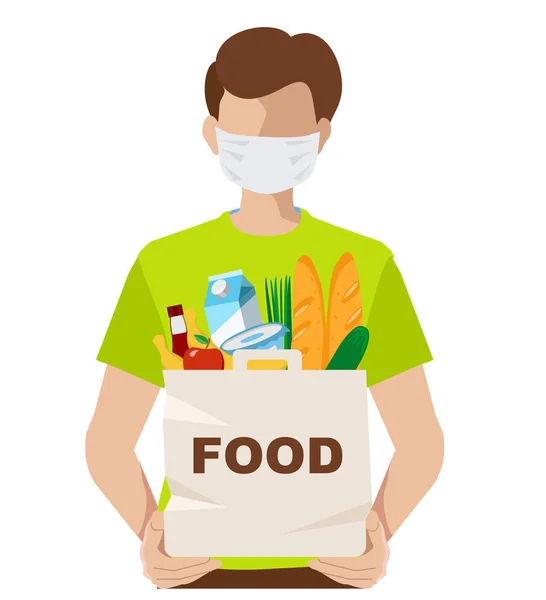 Volunteer in a medical mask with a food package. Young man wearing a medical mask to prevent the spread of the corona virus. Person holds grocery products in a bag. — Stock Vector