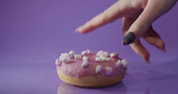 Close Female Holds Hand Colorful White Donut Isolated Pink Background — 비디오