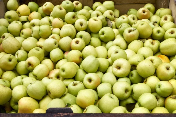 Local market green apples background