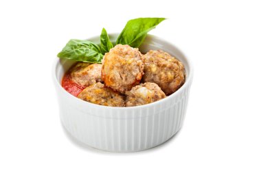 Bowl of meatballs with tomato sauce clipart