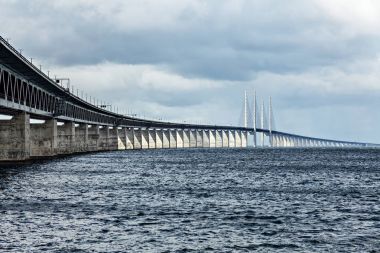 Oresund Bridge connecting Sweden and Denmark. clipart