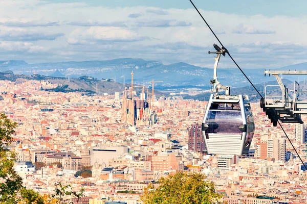 Cable car to Montjuic hill. Cityscape of Barcelona. Sagrada Fami — Stock Photo, Image