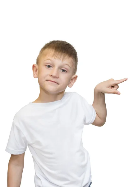 Emotional portrait of caucasian teen boy. Funny teenager pointing and looking upwards while laughing, isolated on white background. Handsome happy child pointing at copy space. — Stock Photo, Image