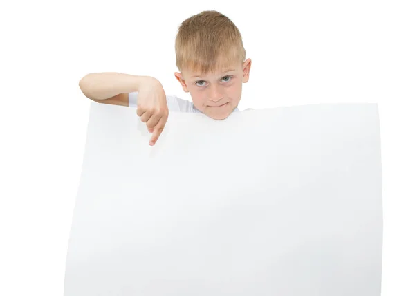 Emotional blond boy in a white shirt with a gray sheet of paper for notes on a white background — Stock Photo, Image