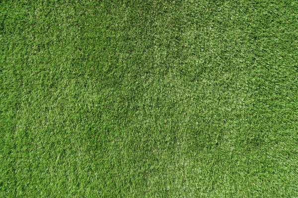 Поддельная трава в среднем крупным планом — стоковое фото