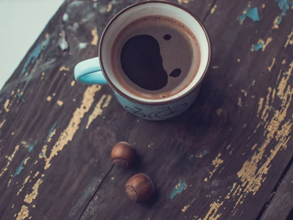 Coffee cup on the wooden background Royalty Free Stock Images