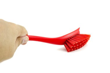 kırpılmış görüntü, beyaz izole kırmızı placstic fırça tutan el