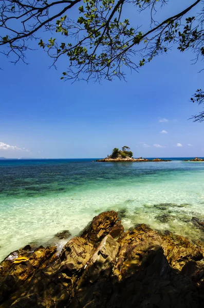 Hidden beauty of Kapas Island located in Terenganu, Malaysia at sunny day. blue sky and clear sea water.