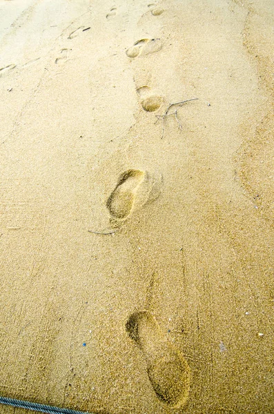 Foot print on sandy beach for leisure and vacation — Stock Photo, Image