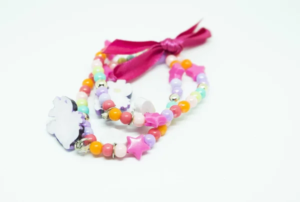 Colorful bracelet on white background — Stock Photo, Image