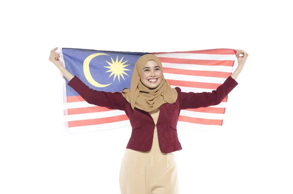 Joven civil malayo con cara feliz celebrando el día independiente. bandera de mano —  Fotos de Stock