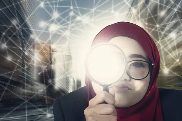 businesswomen keep searching using her magnifier over abstract connection line background
