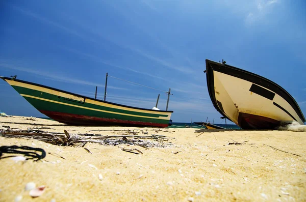 Beauty in nature,fisherman boat stranded on deserted sandy beach