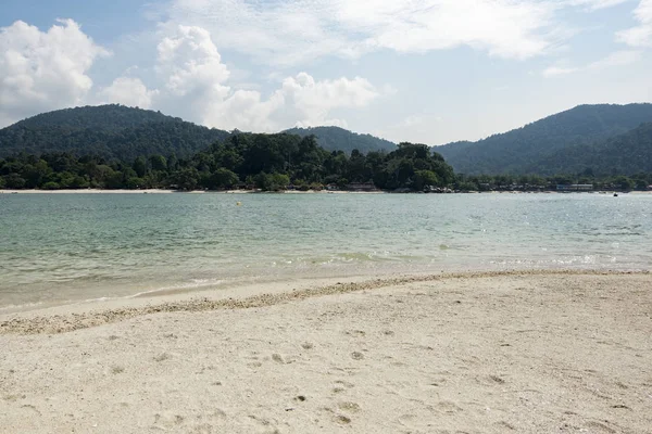 Beauty in nature of tropical island background located at Malaysia with crystal clear turquoise water and blue sky