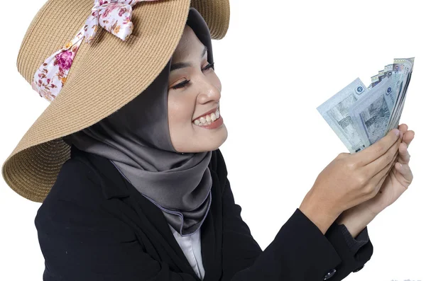 Concepto de crecimiento empresarial, expresión feliz mujer de negocios joven sosteniendo el billete sobre fondo blanco —  Fotos de Stock