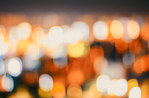 Abstract defocus of colorful glittering shine bulbs lights background