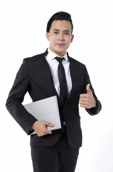 Jovem Empresário Bonito Confiante Terno Preto Segurando Laptop Sorrindo Enquanto — Fotografia de Stock