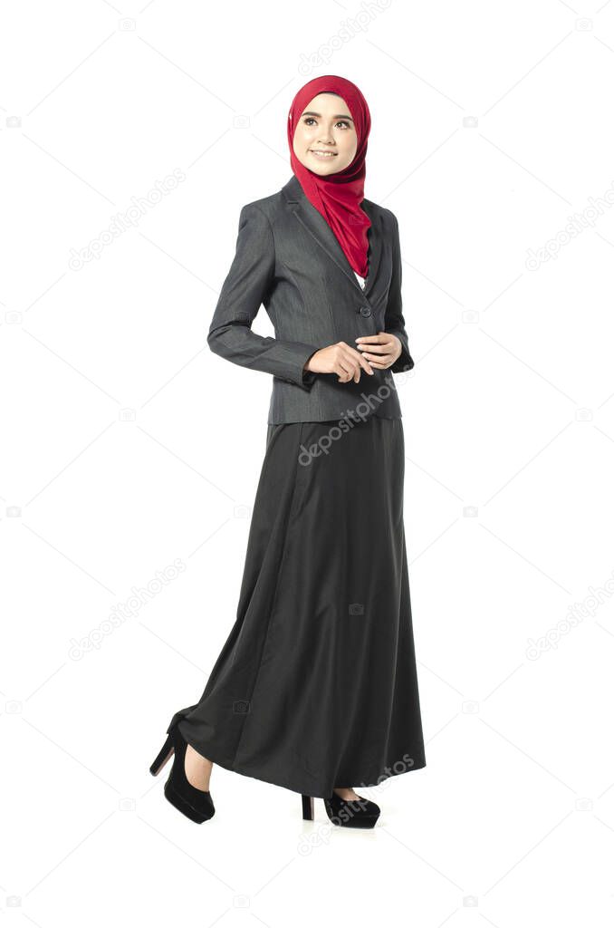 Student and business concept,young woman with hijab in suit standing over white background