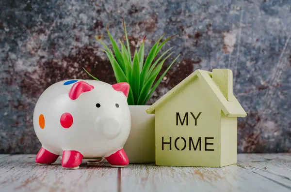 Saving Money Future Concept Piggy Bank Home Replica Wooden Desk — Stock Photo, Image