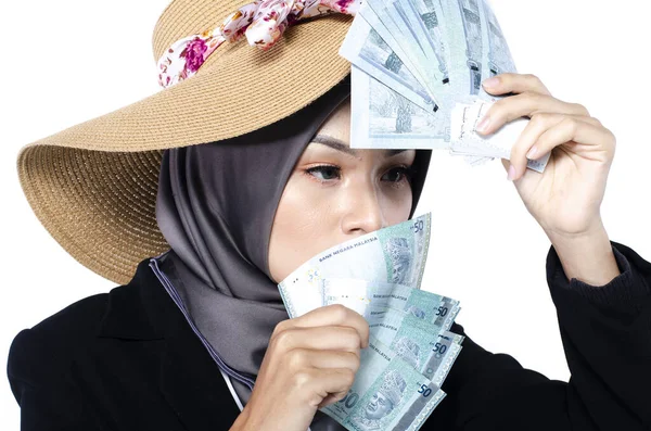 히잡에 사업가의 은돈에 욕망을 가지고 바라본다 — 스톡 사진