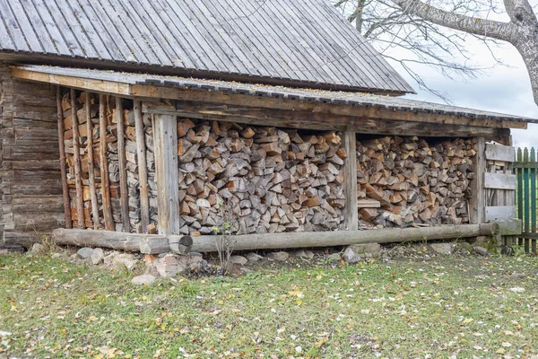 Firewood for the furnace. The woods are stacked.