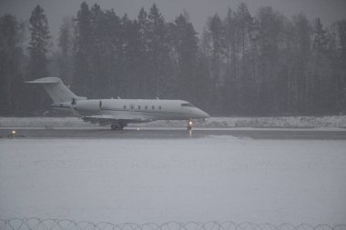 Airplane in hard weather.