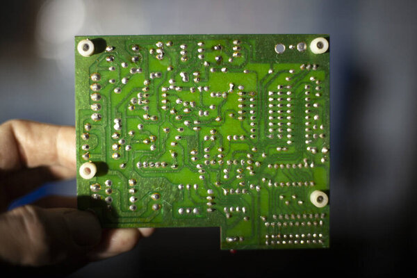 Microchip in the hand.