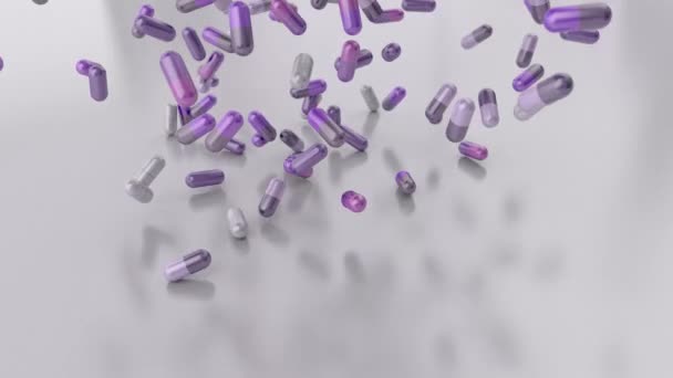 Pillen drugs capsules vallen op witte tabel counter top slowmotion close-up 4k — Stockvideo