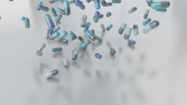 Beyaz masa counter üst ağır çekim portre 4 k üzerinde düşen hap ilaç kapsül