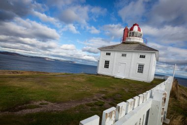 Cape Spear Lighthouse overlooking the Atlantic Ocean clipart