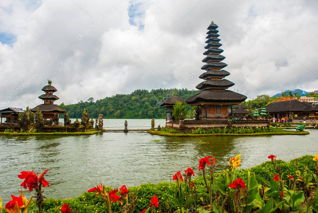 Pura Ulun Danu  Batur temple in lake with flowers Bali 