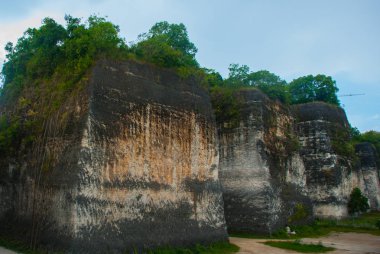 Garuda Wisnu Kencana kültür Park. Duvar orada olan bir kabartma resim Rock. Bali. Endonezya.