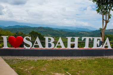 Büyük beyaz harflerle Sabah çay severim. Borneo, Malezya