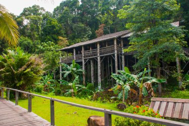 Traditional wooden houses Rumah Orang Ulu Kuching to Sarawak Culture village. Malaysia