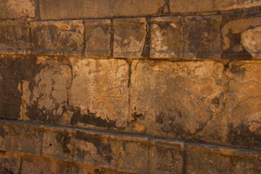 Antik Maya çizimler taş üzerinde. Taş dokusu. Chichen Itza, Meksika. Yucatan