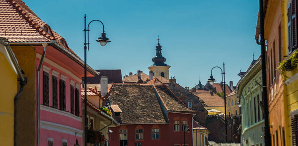 SIBIU, ROMANIA: Beautiful street with old traditional houses in the old town Sibiu